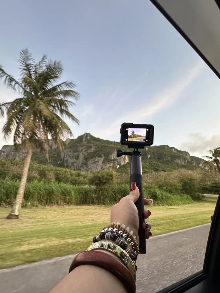 Travel content creator filming while traveling to earn money online